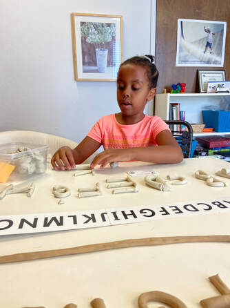 East Bay Dyslexia Solutions client masters her alphabet in clay!