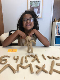 East Bay Dyslexia Solutions client masters her alphabet with clay!